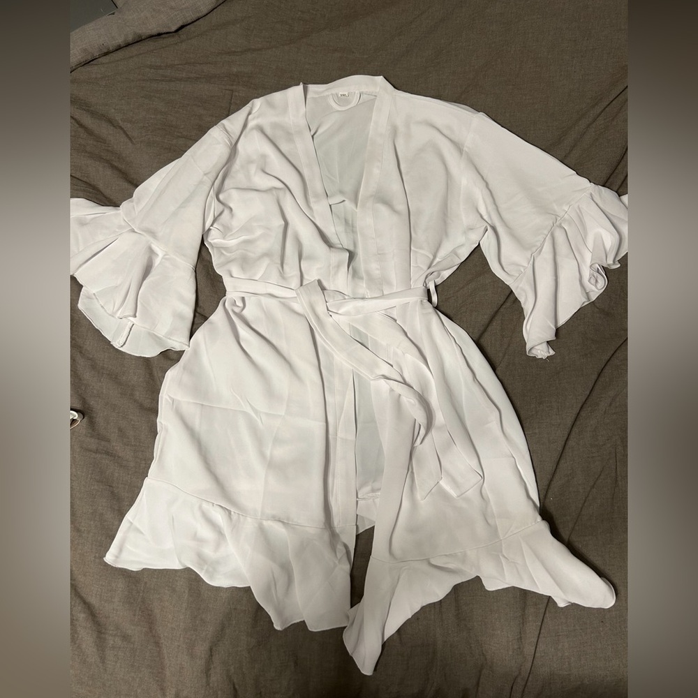 white flutter sleeve robe